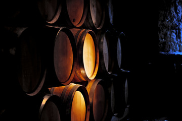 Barrel of wine in winery.