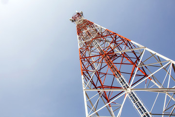 Mobile tower communication antennas with blue sky background