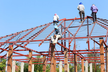 labor working in construction site for roof prepare