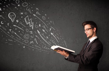 Young man reading a book