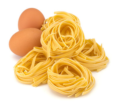 Italian egg pasta nest isolated on white background
