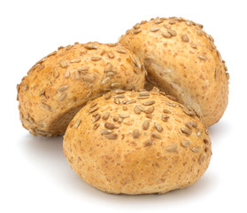 Round sandwich bun with sunflower seeds isolated on white backgr