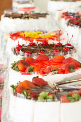 Close up cake with strawberries and cream