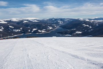 Ski slope above the lake