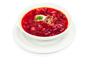 Borsch, red beetroot soup in white plate, menu restaurant