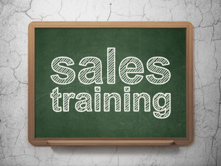 Marketing concept: Sales Training on chalkboard background