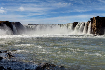 Godafoss waterfalls with mountain in Iceland