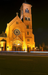 Fototapeta na wymiar Pseudo-gotycki kościół w nocy w Poznaniu.