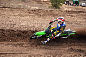 MX racer, with a large slope in gritty