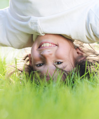 Group of happy children playing outdoors in spring park