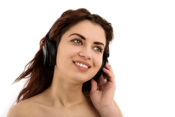 Young woman with headphones listening music .Music teenager girl