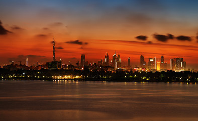 Skyline view of Dubai at Sunset as viewed from across the water