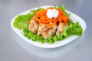 Grilled chicken on salad