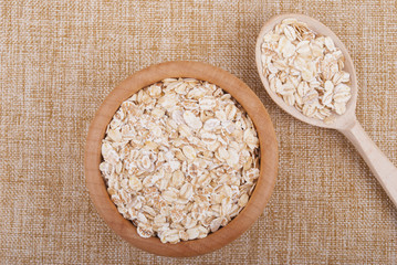 Wooden plate with cereal.