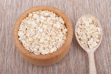 Wooden plate with cereal.