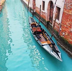 Wall murals Gondolas gondola in a canal