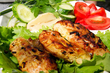Grilled chicken on salad