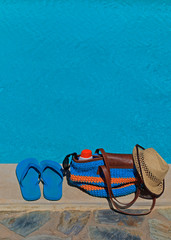 Naklejka premium summer beach bag and flip flops for outdoor pool