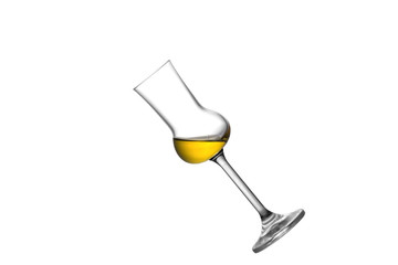A tilted grappa glass