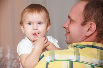 Close up portrait newborn baby in father hands