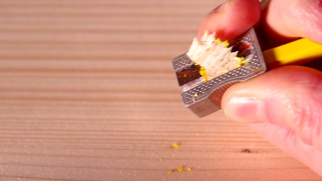 Pencil sharpener and a yellow pencil