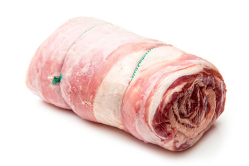 Rolled lamb breast joint,isolated on a white studio background.