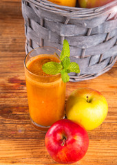 Fresh apple juice with nature background 