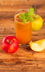 Fresh apple juice with nature background 