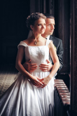 Fototapeta premium Newlyweds embraces