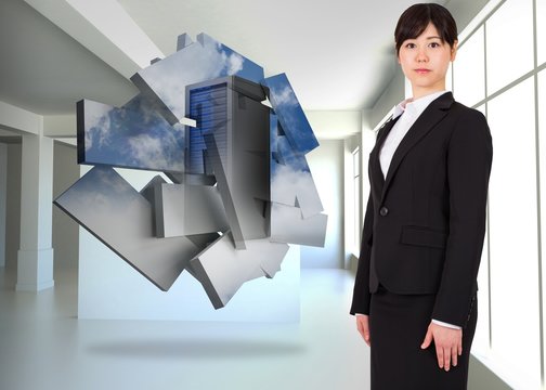 Composite image of serious businesswoman