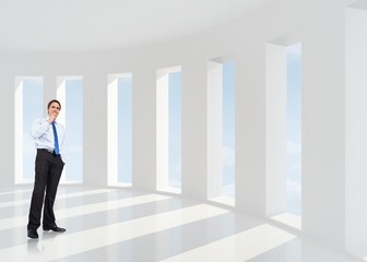 Fototapeta premium Composite image of thinking businessman touching chin