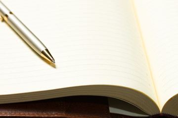 pen and open notepad