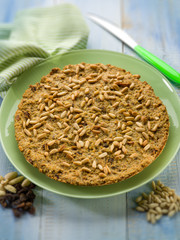bread cake with almond pine nuts and dried grape,selective focus
