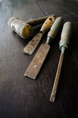 Fototapeta na wymiar set of carpenter tools on wood background