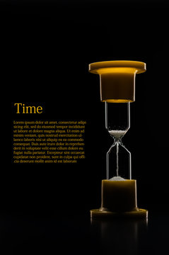 hourglass on black background