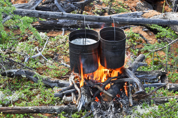 Cooking on camp fire.
