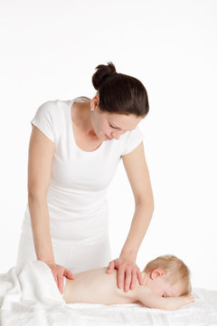 Massage therapist with her little patient.