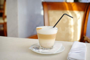 cup of latte on a table in a restaurant