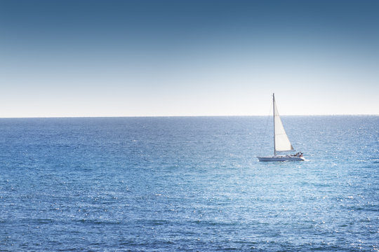 Yacht Sailing on water of ocean