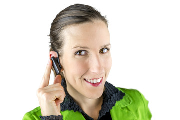Woman touching the hands free placed at her ear