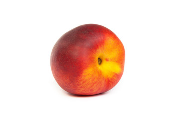 Three fresh nectarines on white