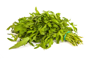 Arugula/rucola  fresh heap leaf on white