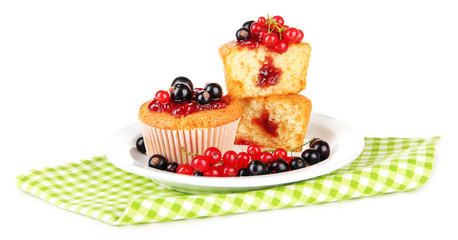 Tasty muffins with berries isolated on white