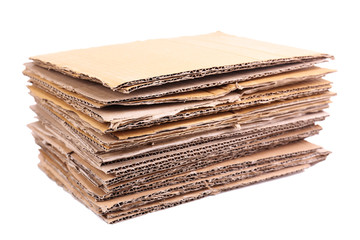 Stack of cardboard for recycling isolated on white