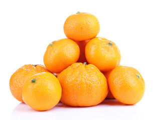 Ripe sweet tangerines, isolated on white