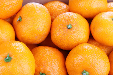Ripe sweet tangerines background