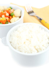 Cooked rice and vegetables close up