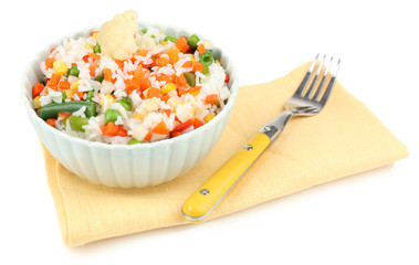 Cooked rice with vegetables isolated on white