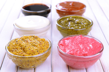 Various sauces on table close-up