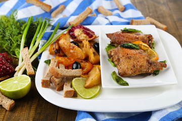 Homemade fried chicken drumsticks with vegetables
